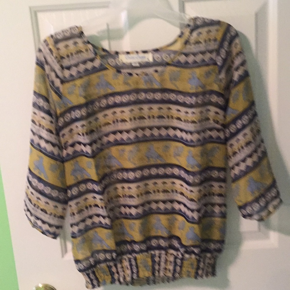Multi colored blouse. Wear a tank under